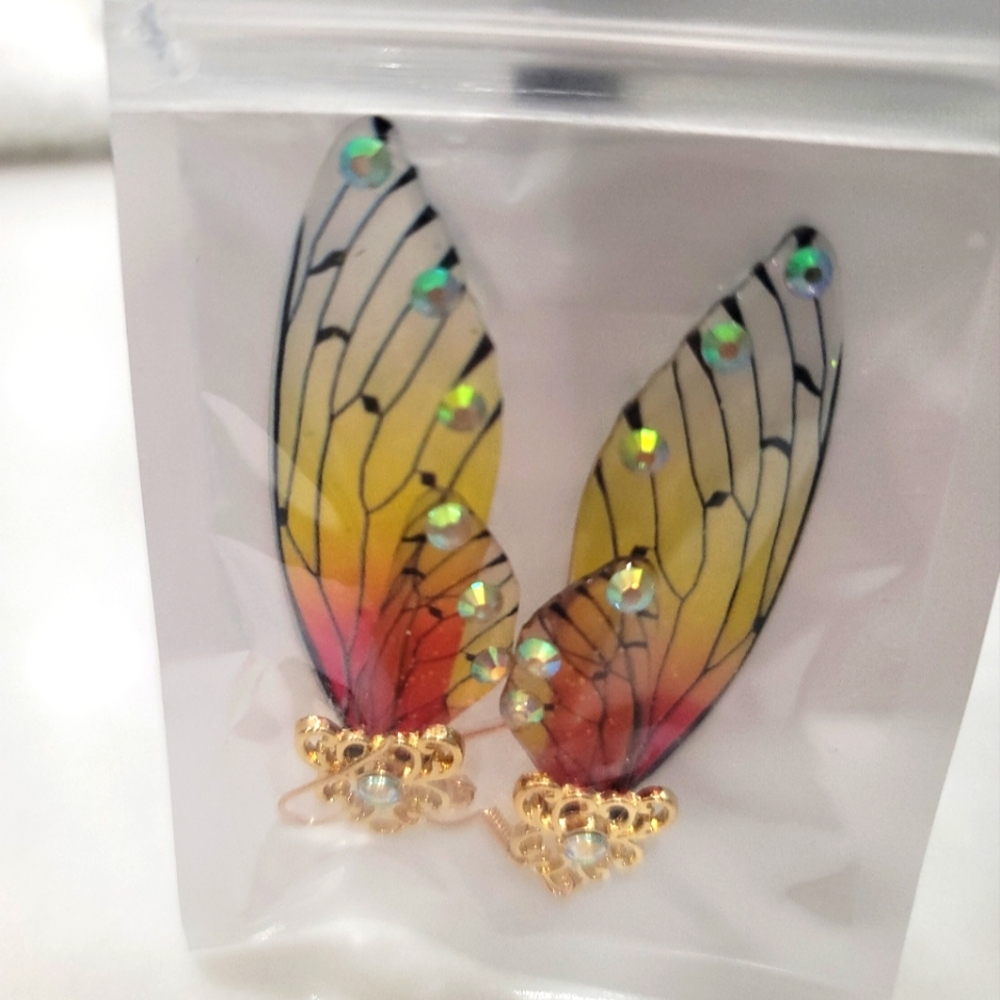 New angel wing earrings. 2.5” long